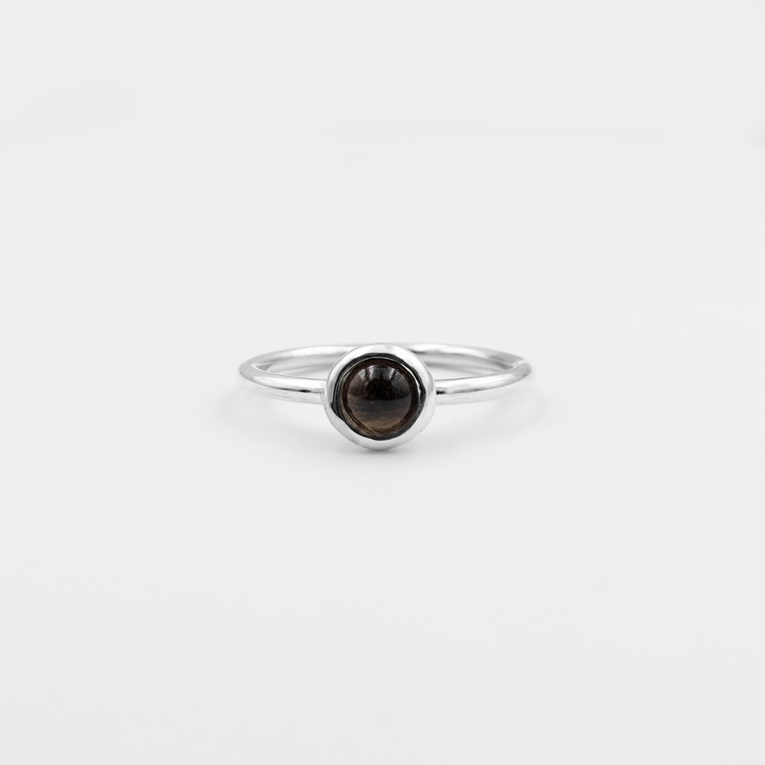 Silver ring with topaz