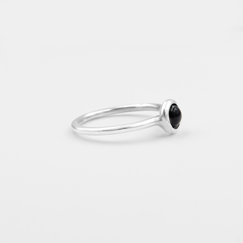 Silver ring with topaz