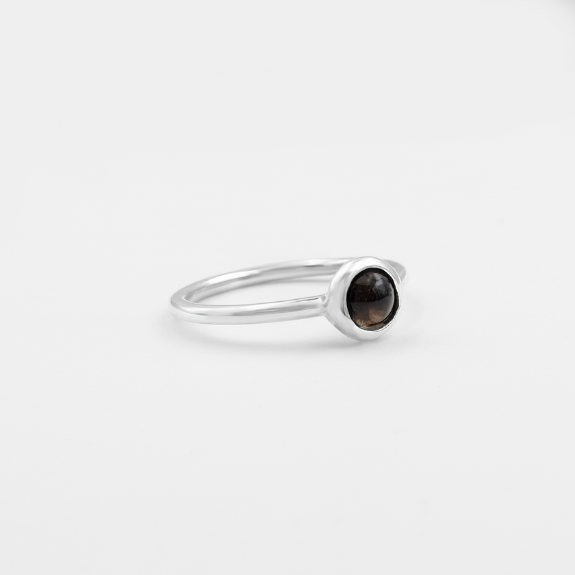 Silver ring with topaz