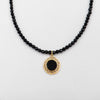 Necklace with onyx pendant