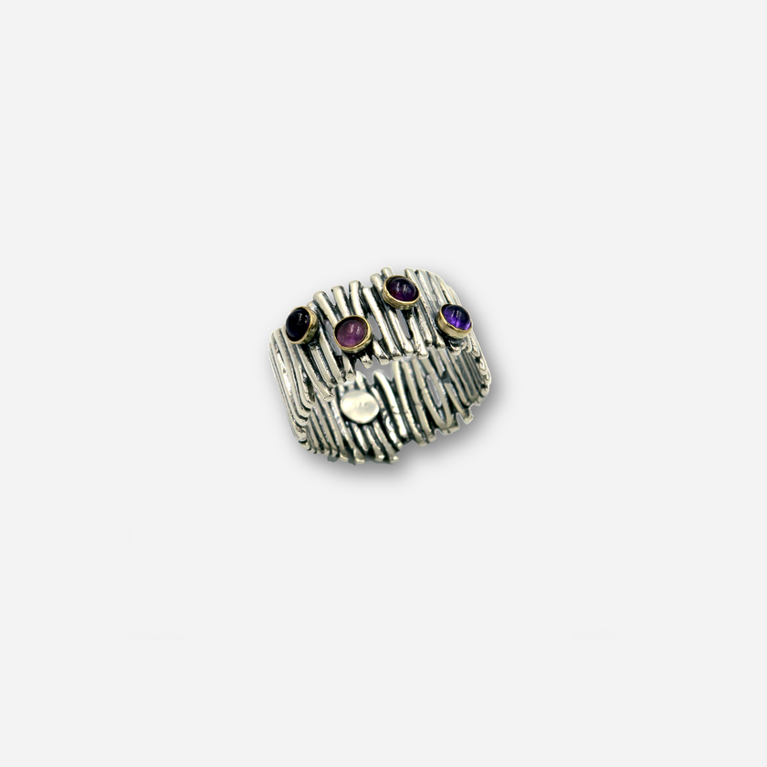 Silver ring with amethyst stones