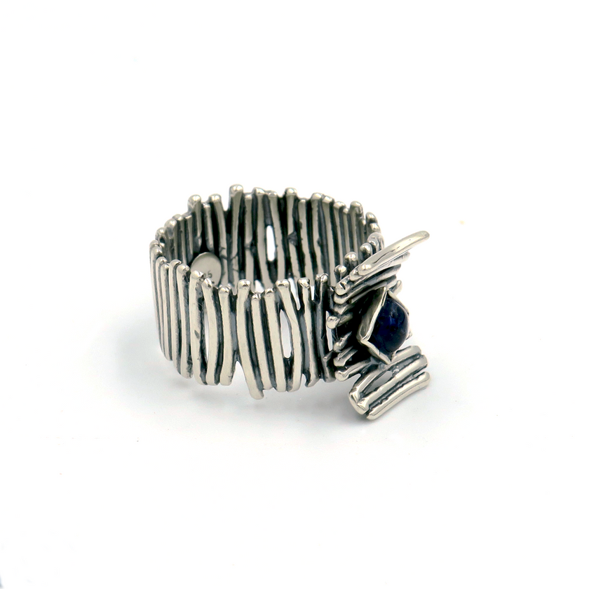 Silver ring with iolite stone