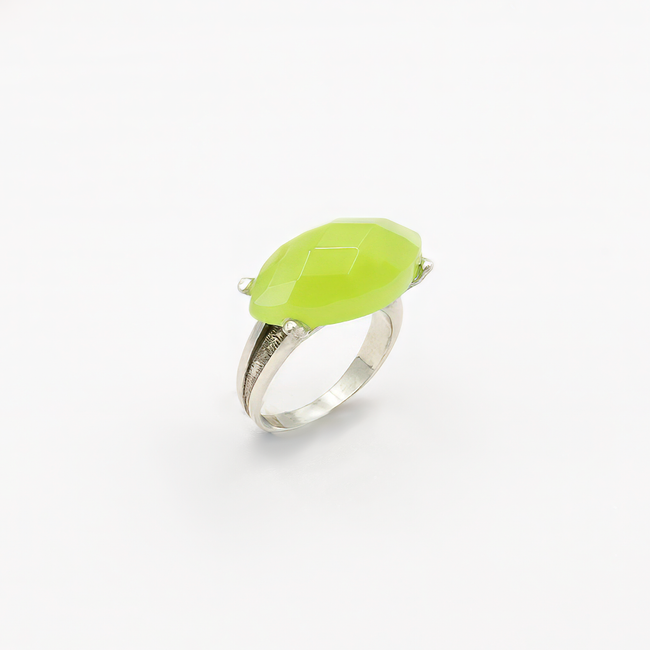 A silver ring combined with an opalite in a shade of lime