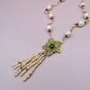 Pearl necklace with flower pendant