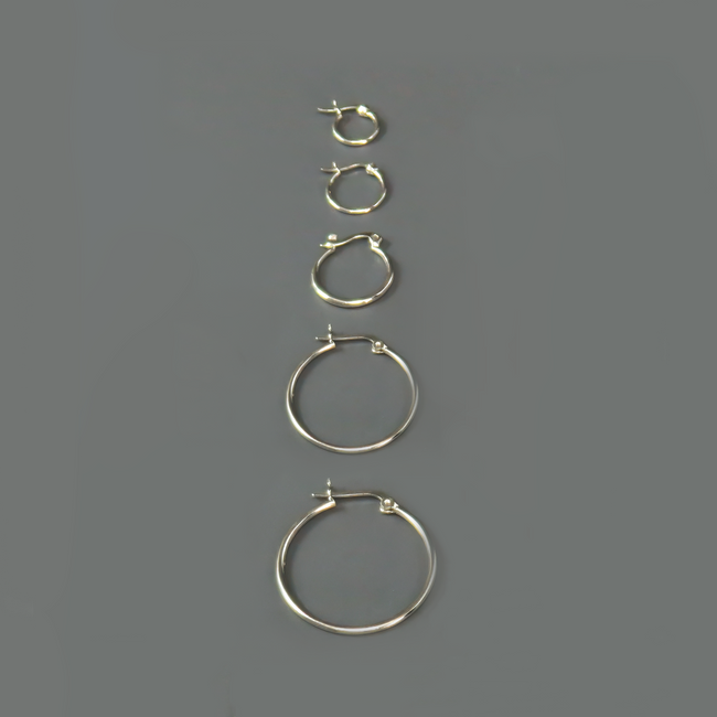 Silver hoop earrings in a variety of different sizes