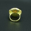 A silver ring with mother of pearl in a delicate pink shade
