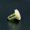 A silver ring with mother of pearl in a delicate pink shade