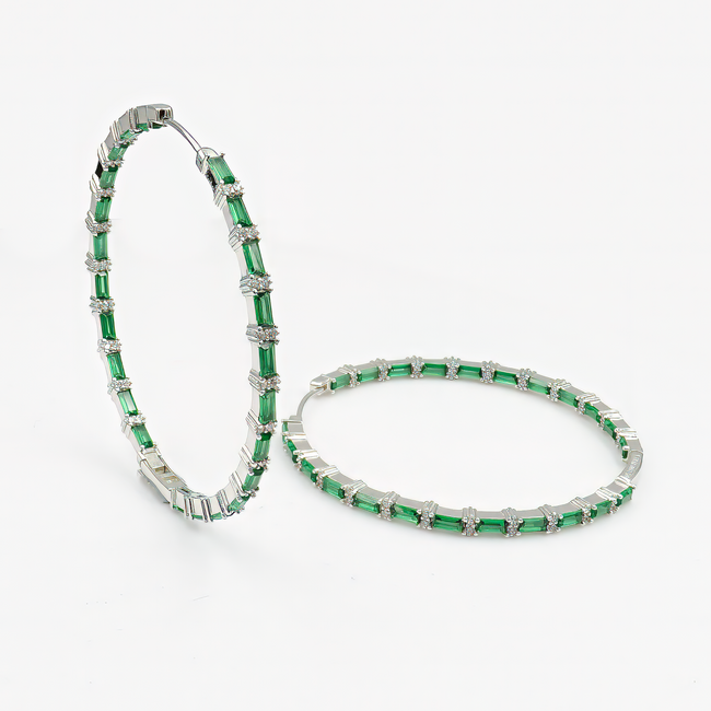Luxurious hoop earrings with a zirconia stone in a shade of emerald