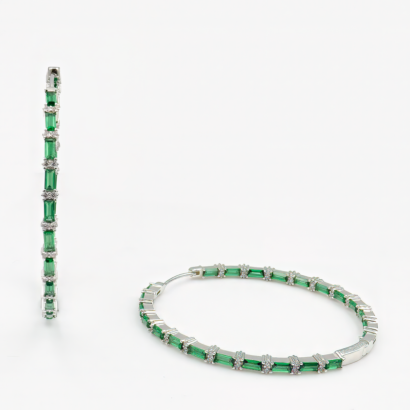 עגילי חישוק עשויים כסף בציפוי זהב או רודיום, עם שיבוץ מדויק של זירקוניה נוצצת בגוון ירוק עמוק של ברקת. התכשיט משלב בין קלאסיקה לנגיעת צבע עזה, ומתאים לנשים שאוהבות לשלב עדינות עם כוח. בחירה מושלמת למתנה יוקרתית עם טעם משובח.
#עגילים_עם_זירקוניה_ברקת #עגילי_חישוק_זהב #ירוק_אלגנטי #תכשיטים_בעבודת_יד #עגילים_קלאסיים #מתנה_יוקרתית #אקססוריז_בסטייל