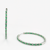 Luxurious hoop earrings with a zirconia stone in a shade of emerald