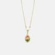 A necklace with a bead pendant in shades of green
