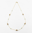 14 carat gold necklace with sunstone and zoisite rubies