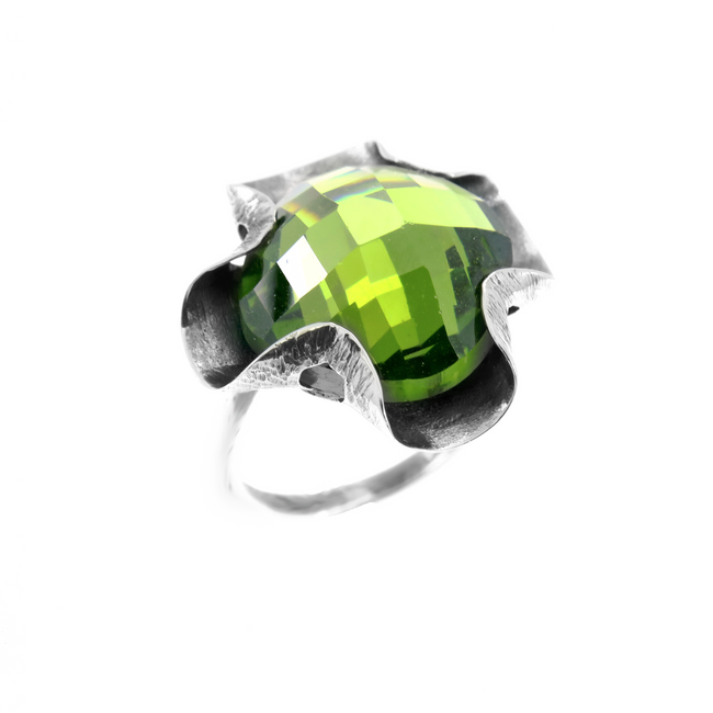 A silver ring combined with a green crystal