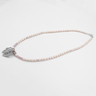 Lavender pearl necklace with butterfly shield pendant