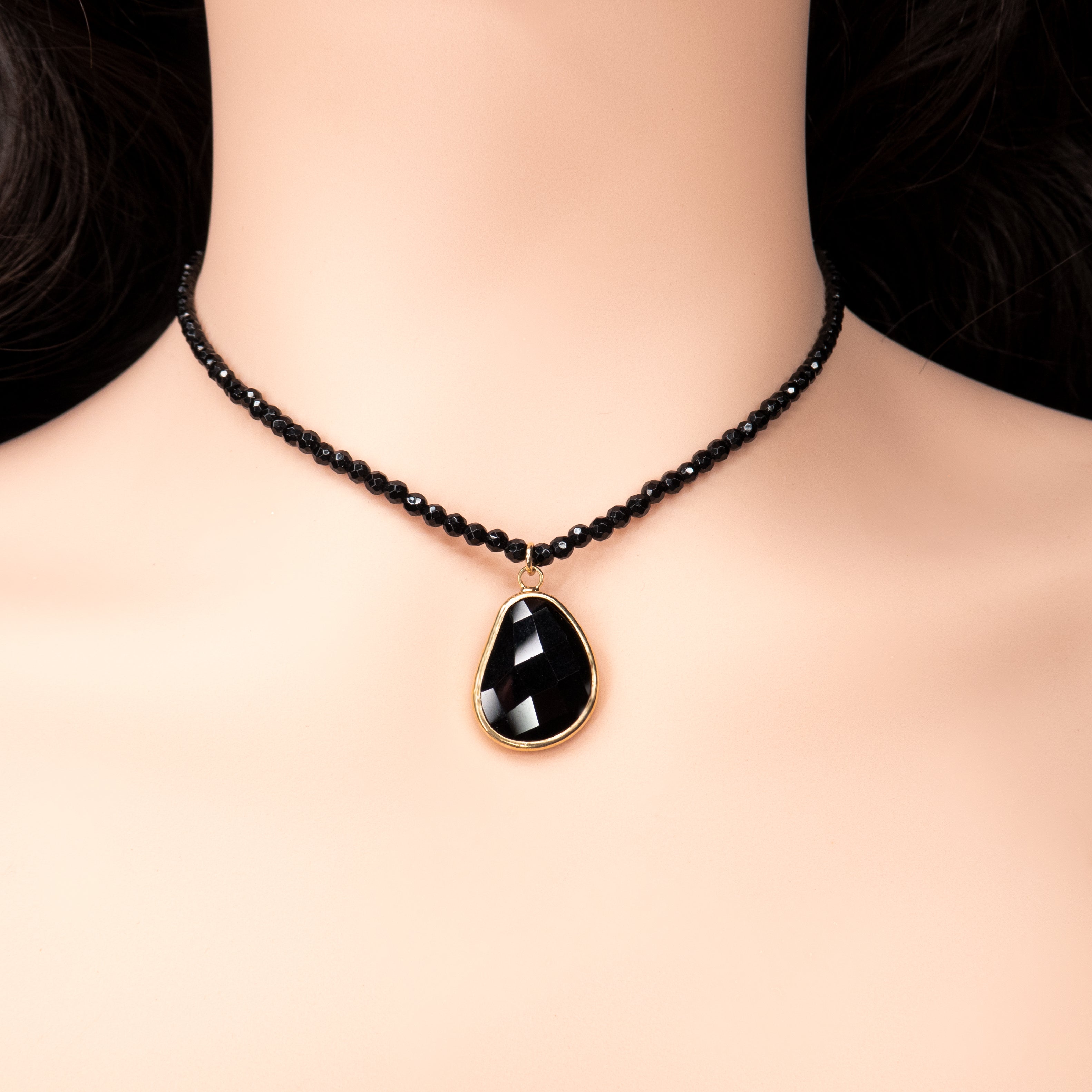 Onyx necklace with a designed pendant