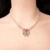 Lavender pearl necklace with butterfly shield pendant