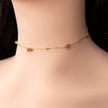 14 carat gold necklace with sunstone and zoisite rubies