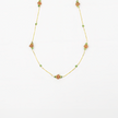 14 carat gold necklace with sunstone and zoisite rubies