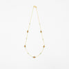 14 carat gold necklace with sunstone and zoisite rubies