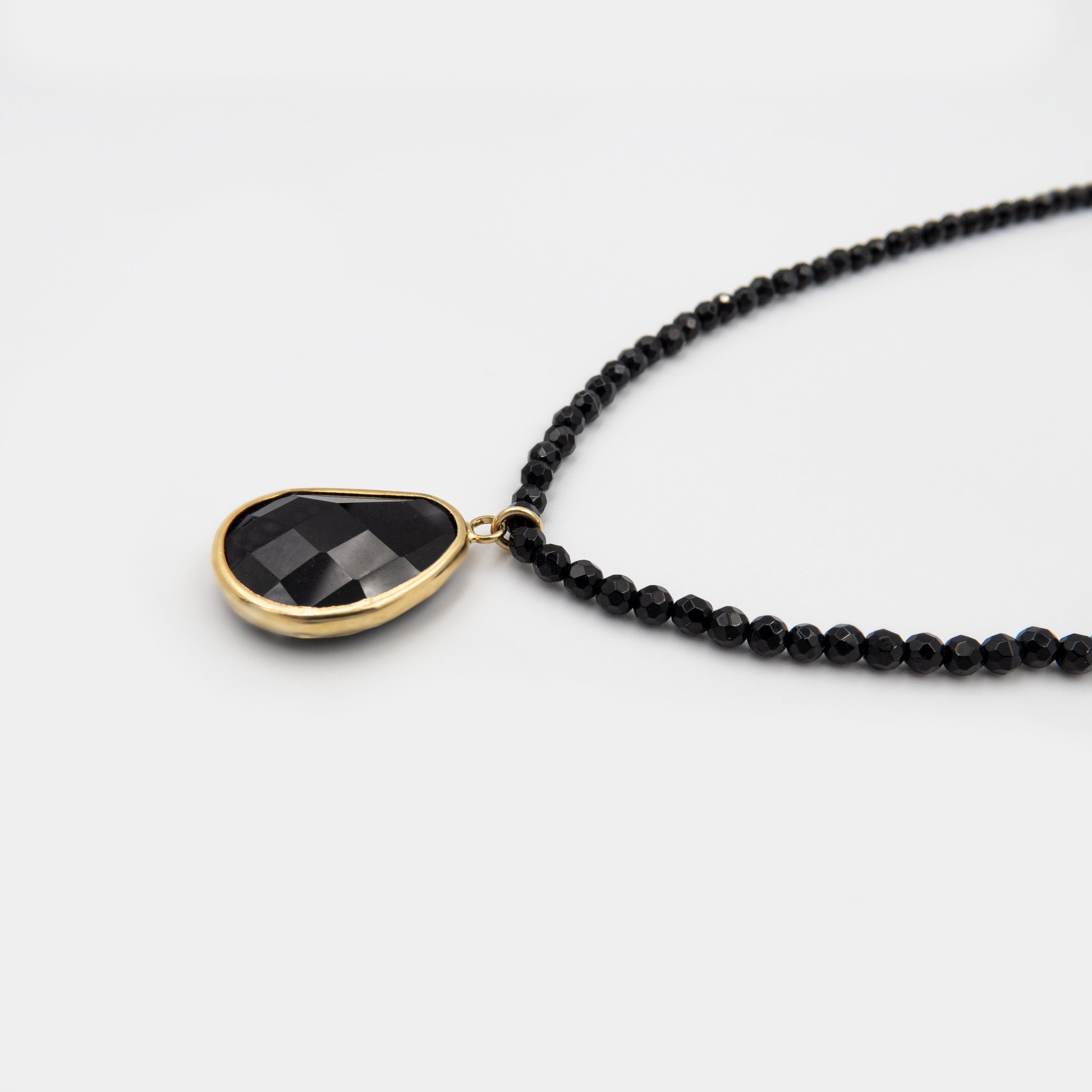 Onyx necklace with a designed pendant