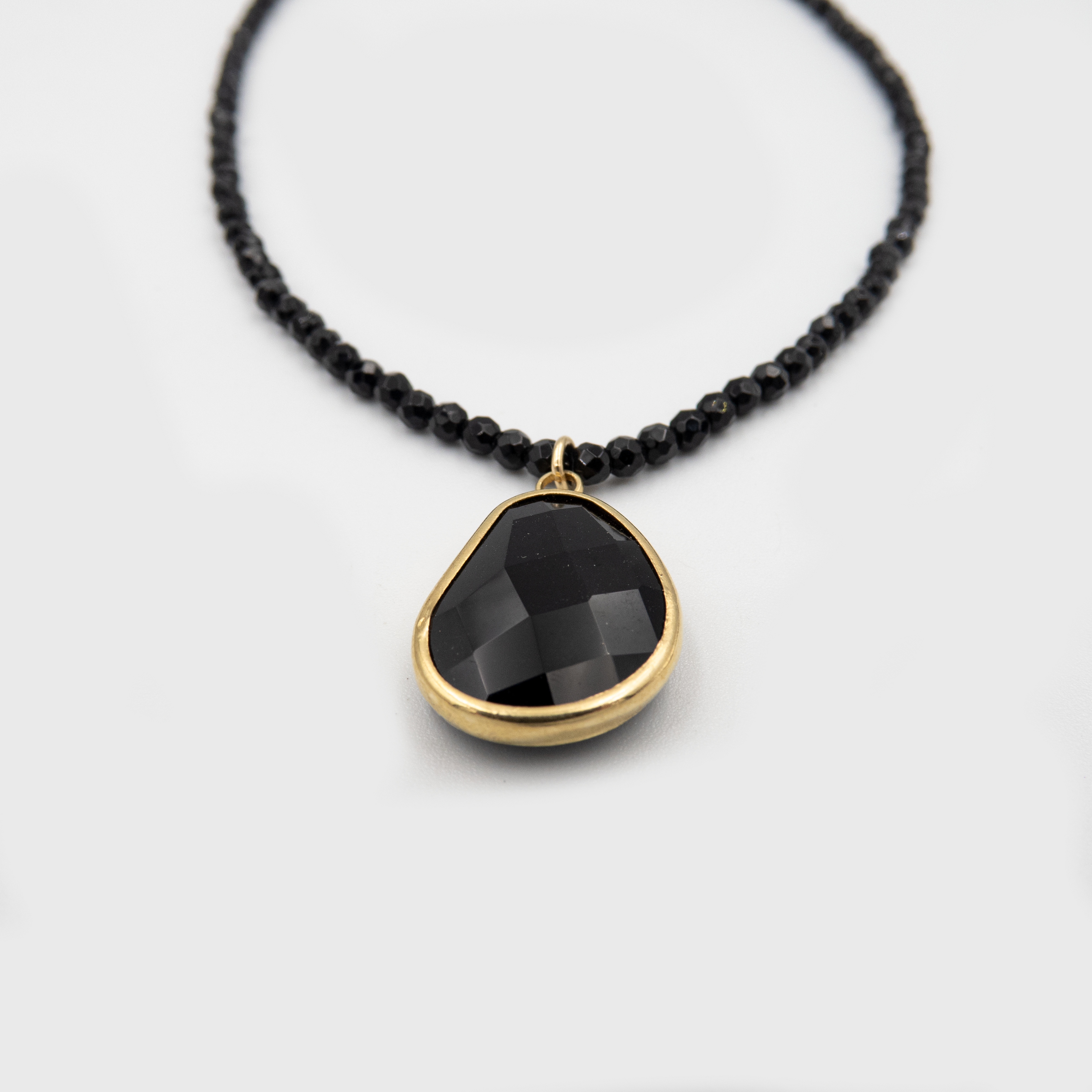 Onyx necklace with a designed pendant