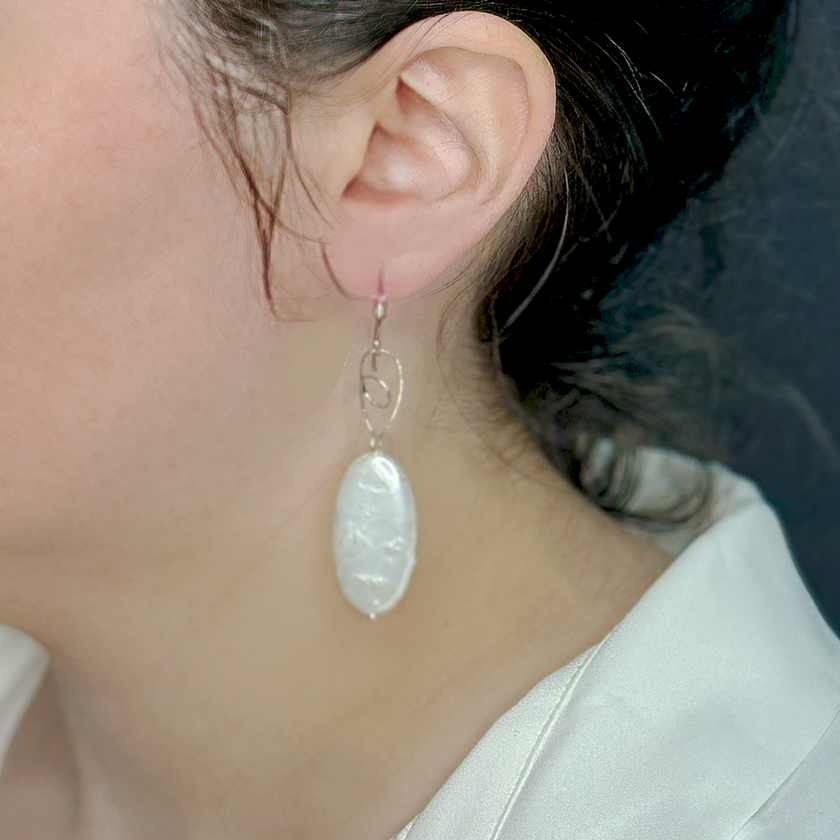 Silver earrings with oval pearl