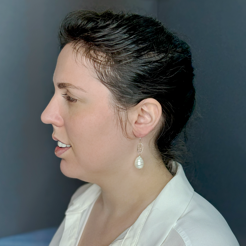 Silver earrings with a pearl in the shape of a drop