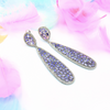 Luxurious long silver earrings with crystals in amethyst shades