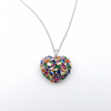 Elegant silver necklace with a multicolored heart pendant