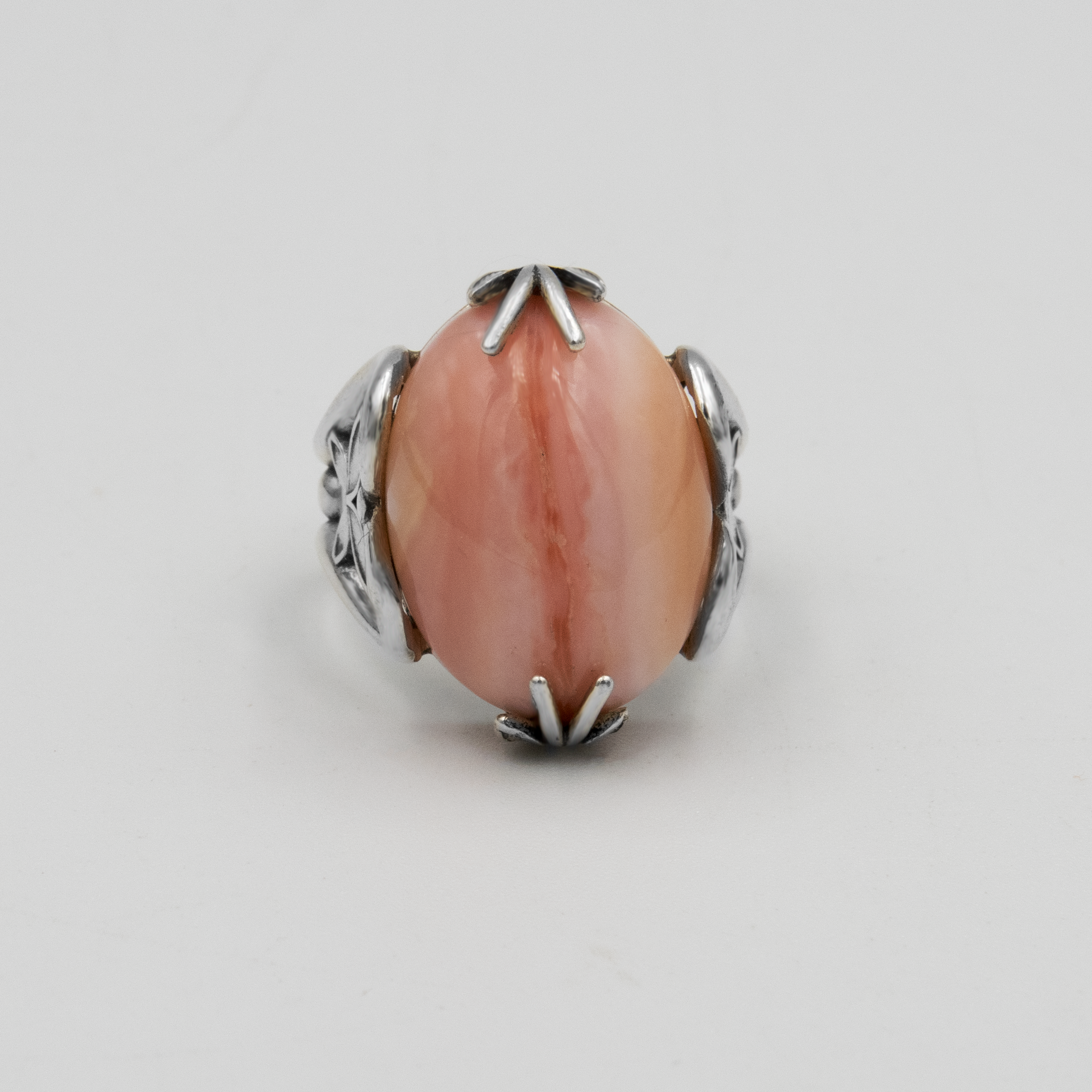Silver ring with natural pink opal
