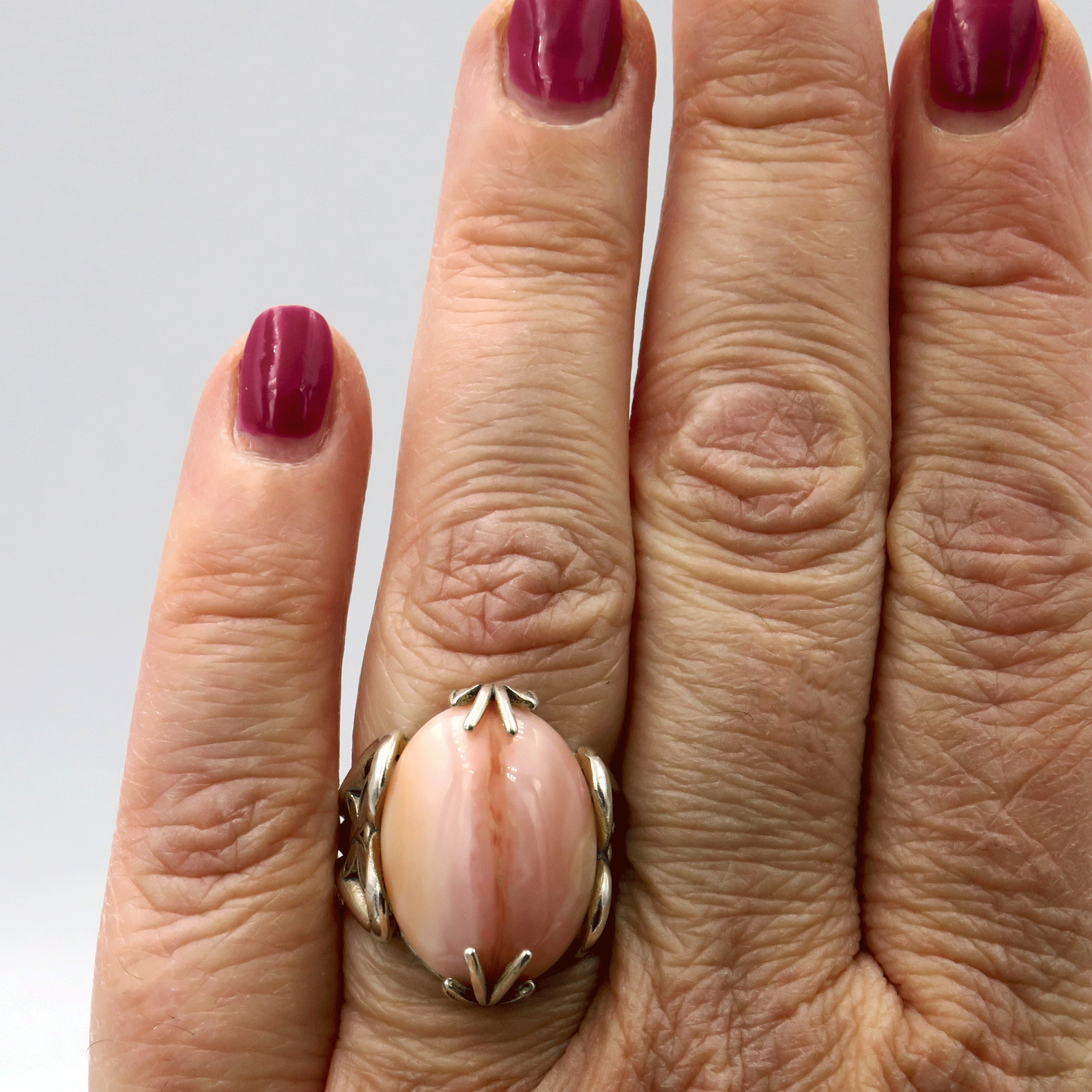 Silver ring with natural pink opal