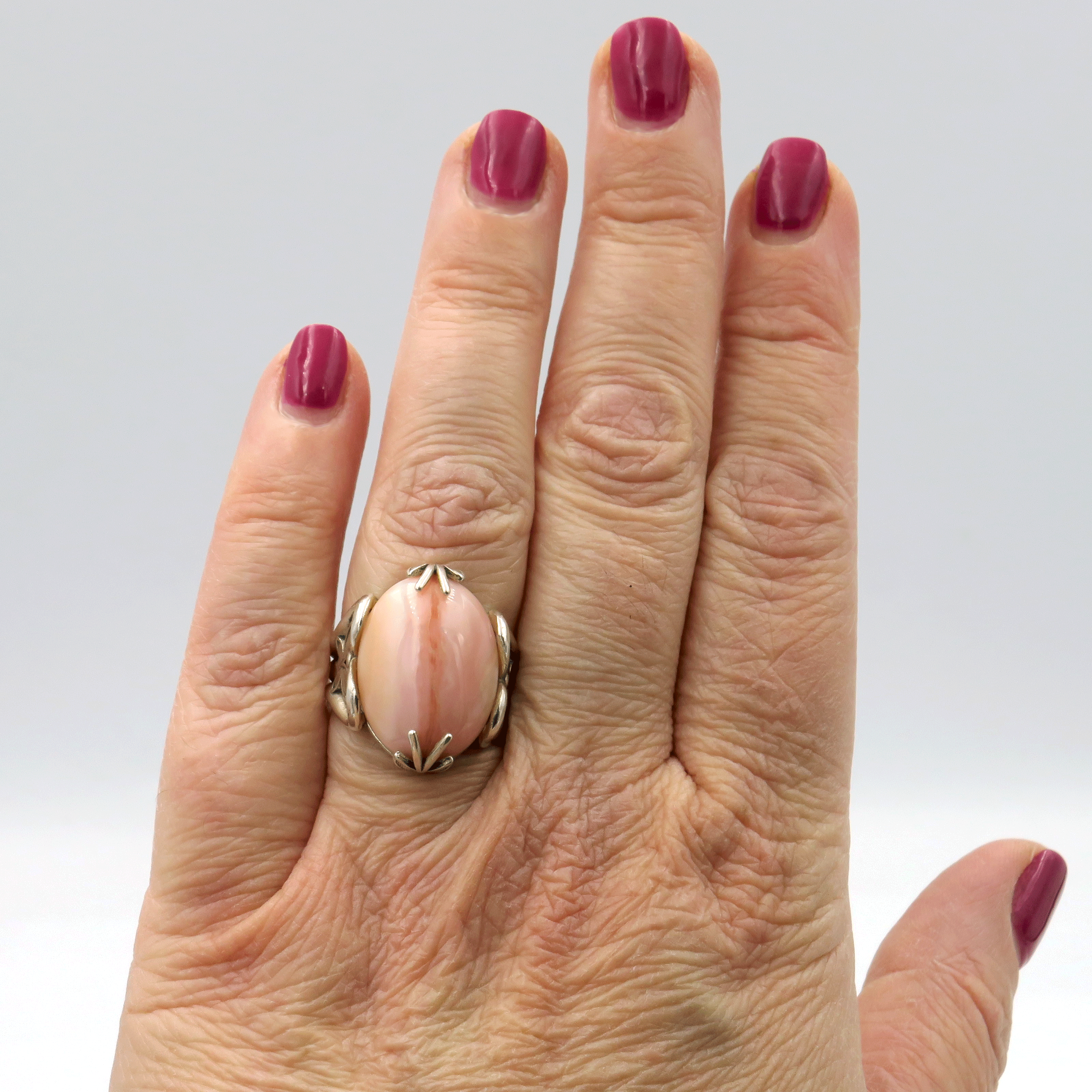 Silver ring with natural pink opal