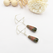 Silver earrings with a drop of Unikate