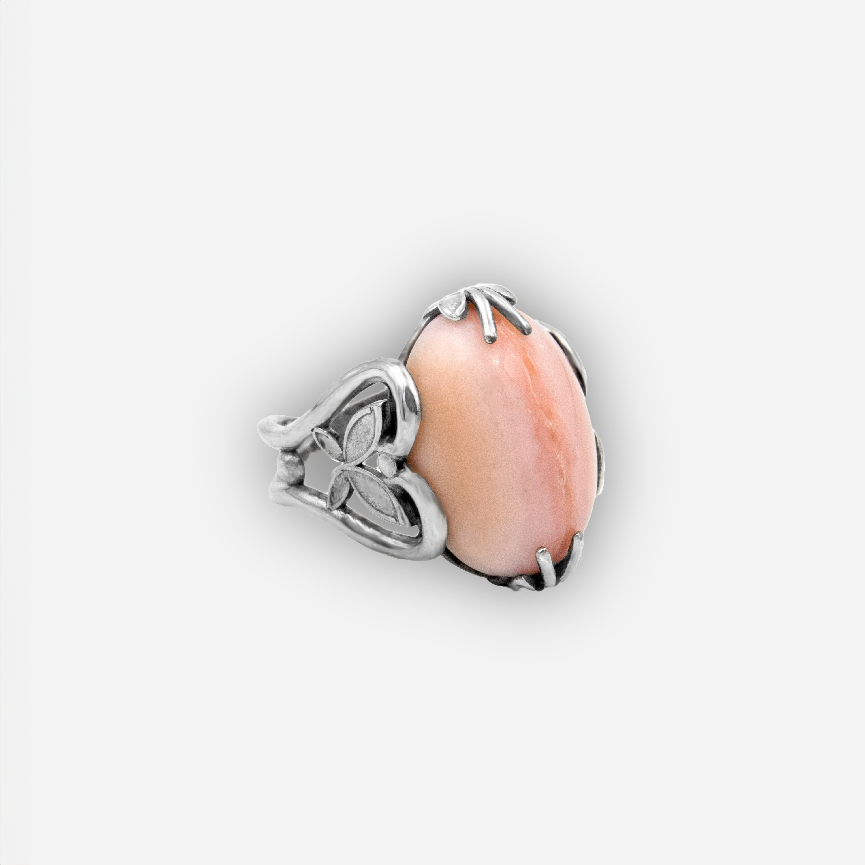 Silver ring with natural pink opal