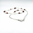 Silver chain, white pearls and red glass beads
