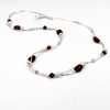 Silver chain, white pearls and red glass beads
