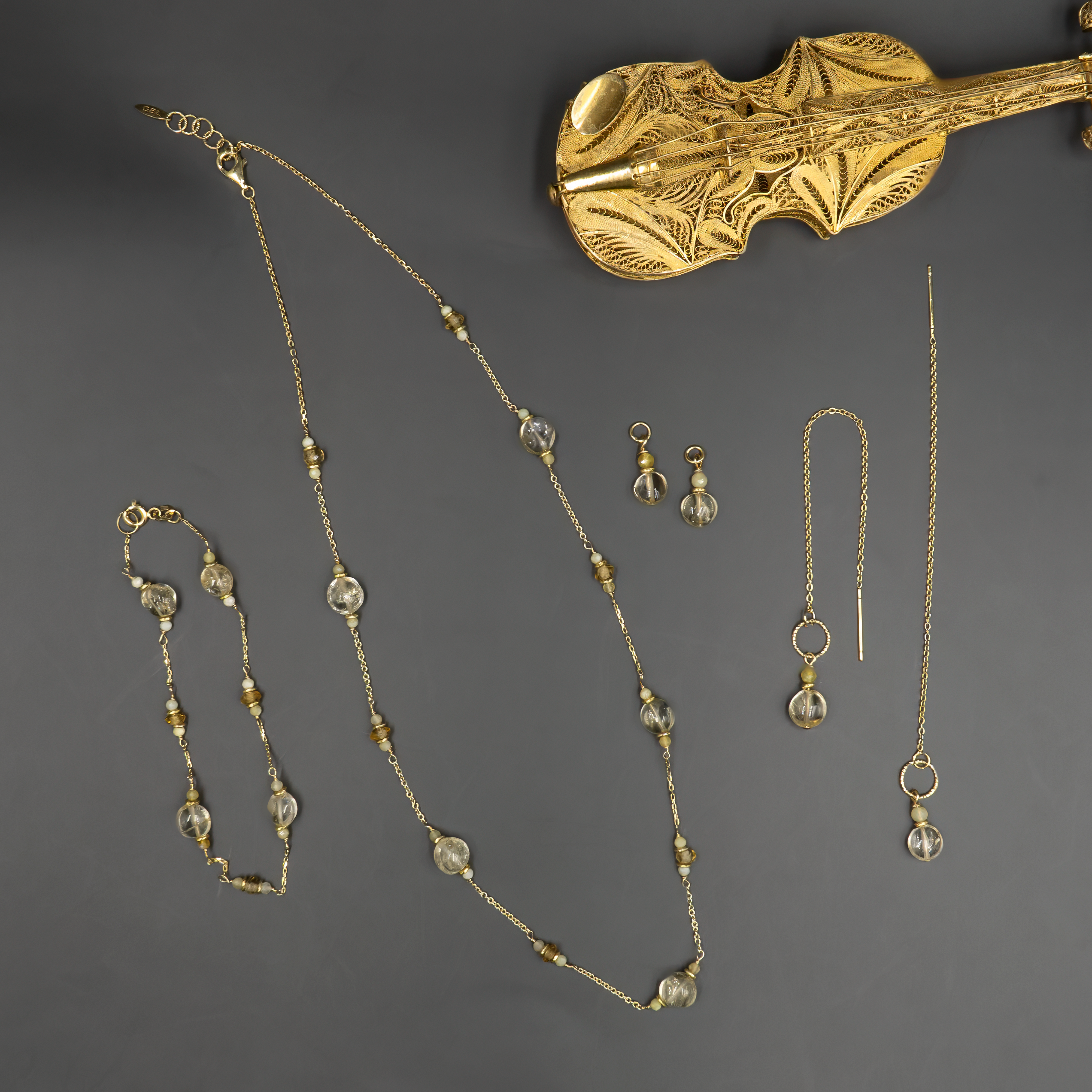 14 carat gold necklace with topaz and opal