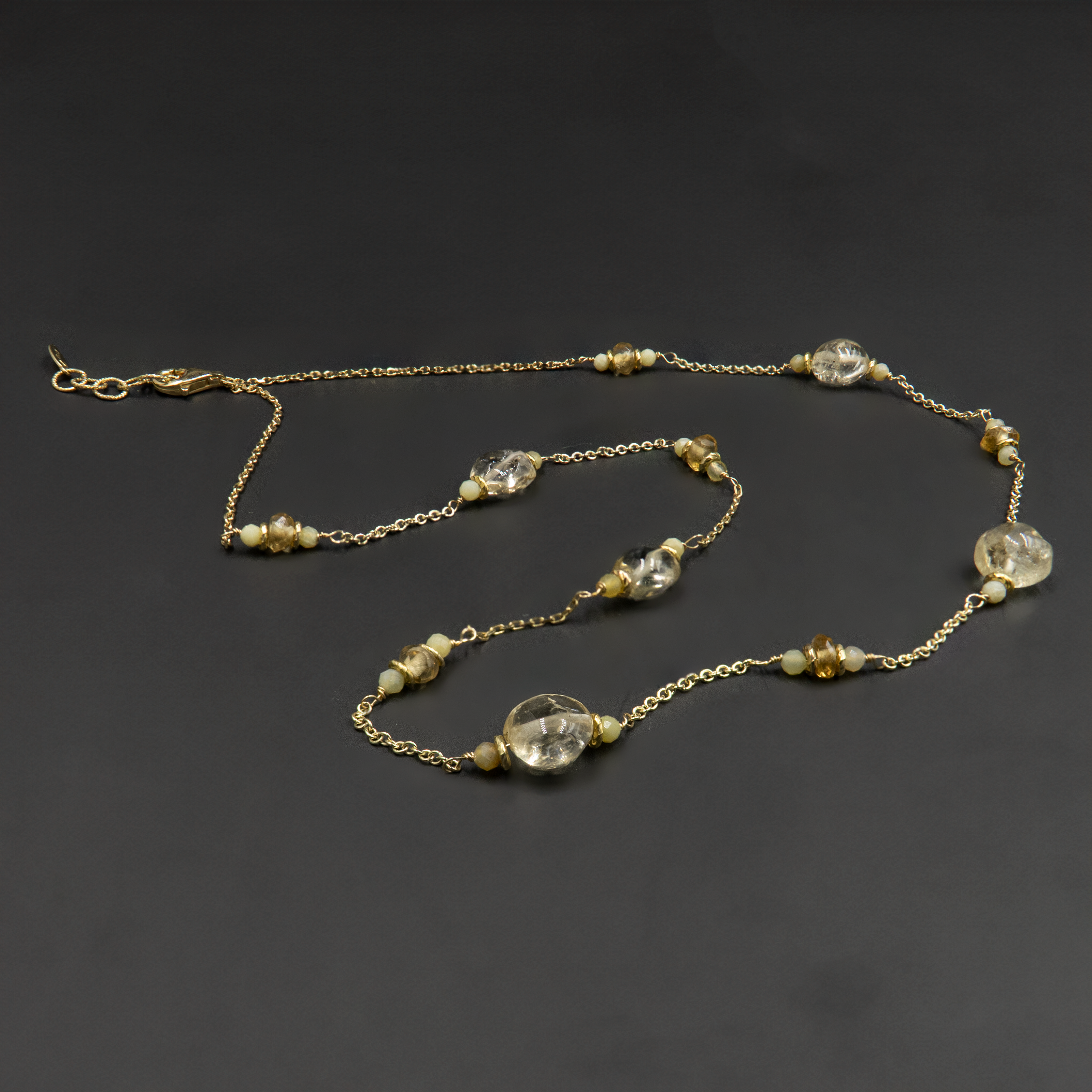 14 carat gold necklace with topaz and opal