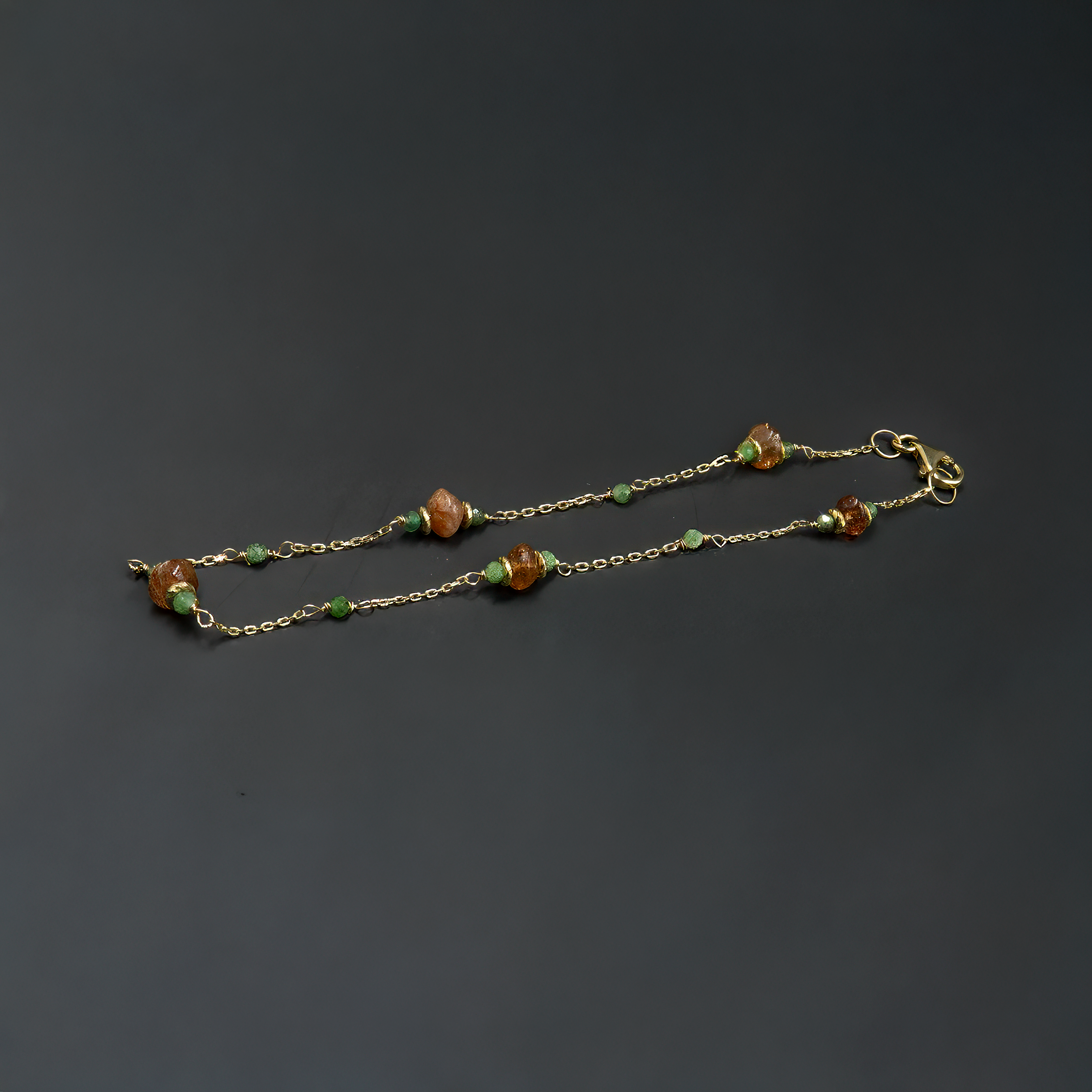 צמיד זהב 14 קראט עם סנסטון ורובי זוייסייט