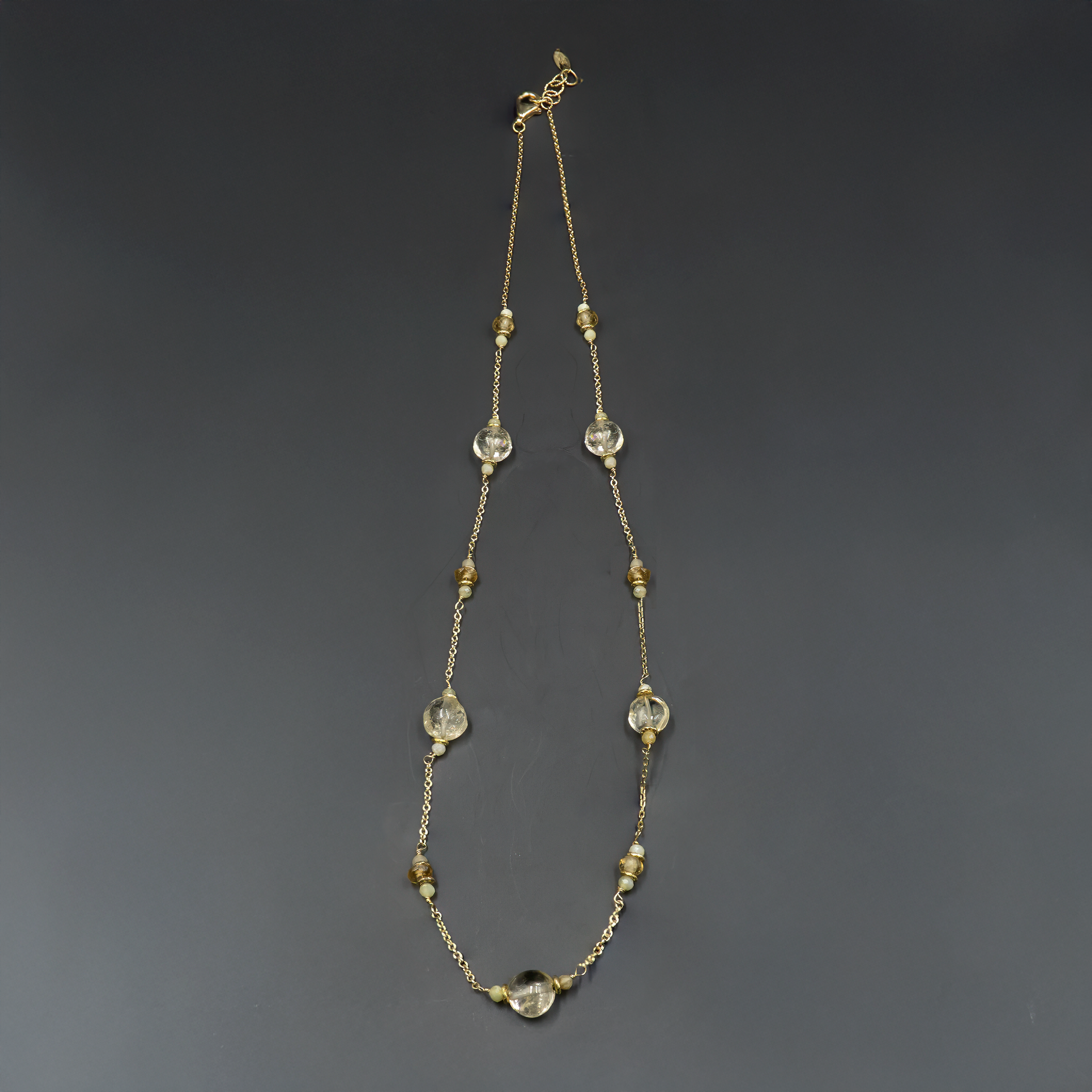 14 carat gold necklace with topaz and opal