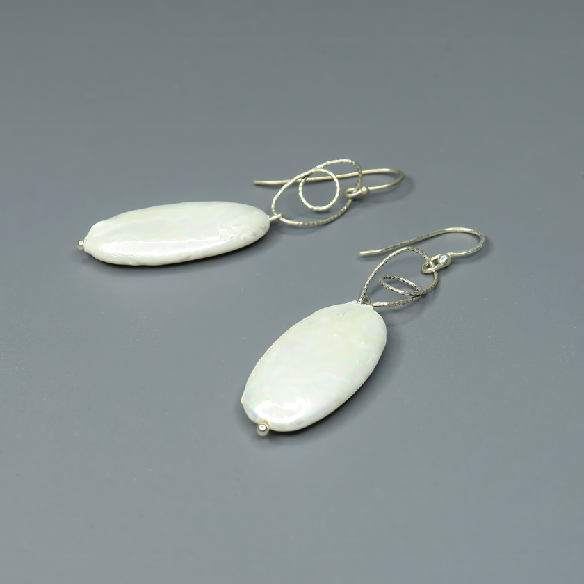 Silver earrings with oval pearl