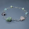 Silver necklace with pliorite stones, rose quartz, amethyst