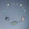 Silver necklace with pliorite stones, rose quartz, amethyst