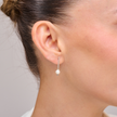 14 karat white gold earrings with a pearl