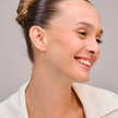 14 carat white gold earrings with coral