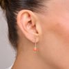 14 carat white gold earrings with coral