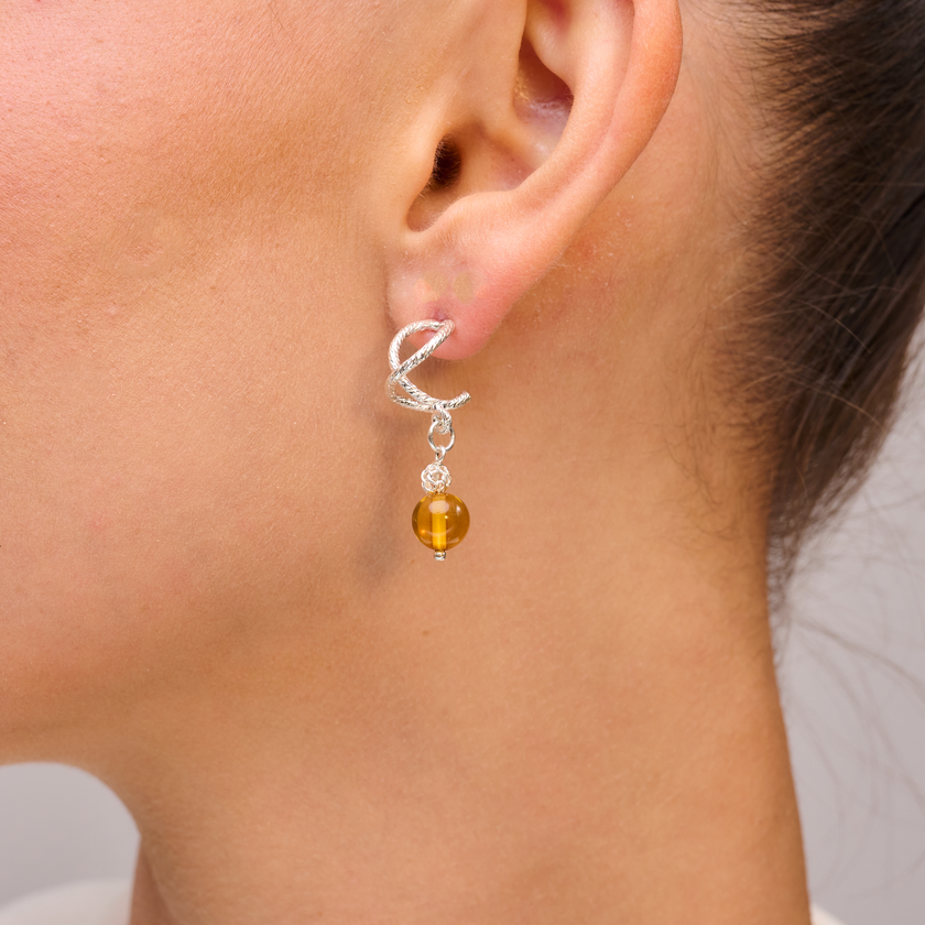 Silver omega earrings with an artificial brook pearl