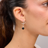 White gold omega earrings with onyx stone
