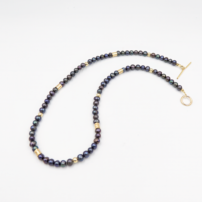 Black pearl necklace and goldfield beads